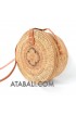 large wide round ata sling bag with small flower pattern